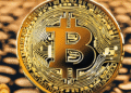 Bitcoin Gains Momentum as Gold Pauses Ahead of Fed Week Insights