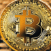 Bitcoin Gains Momentum as Gold Pauses Ahead of Fed Week Insights